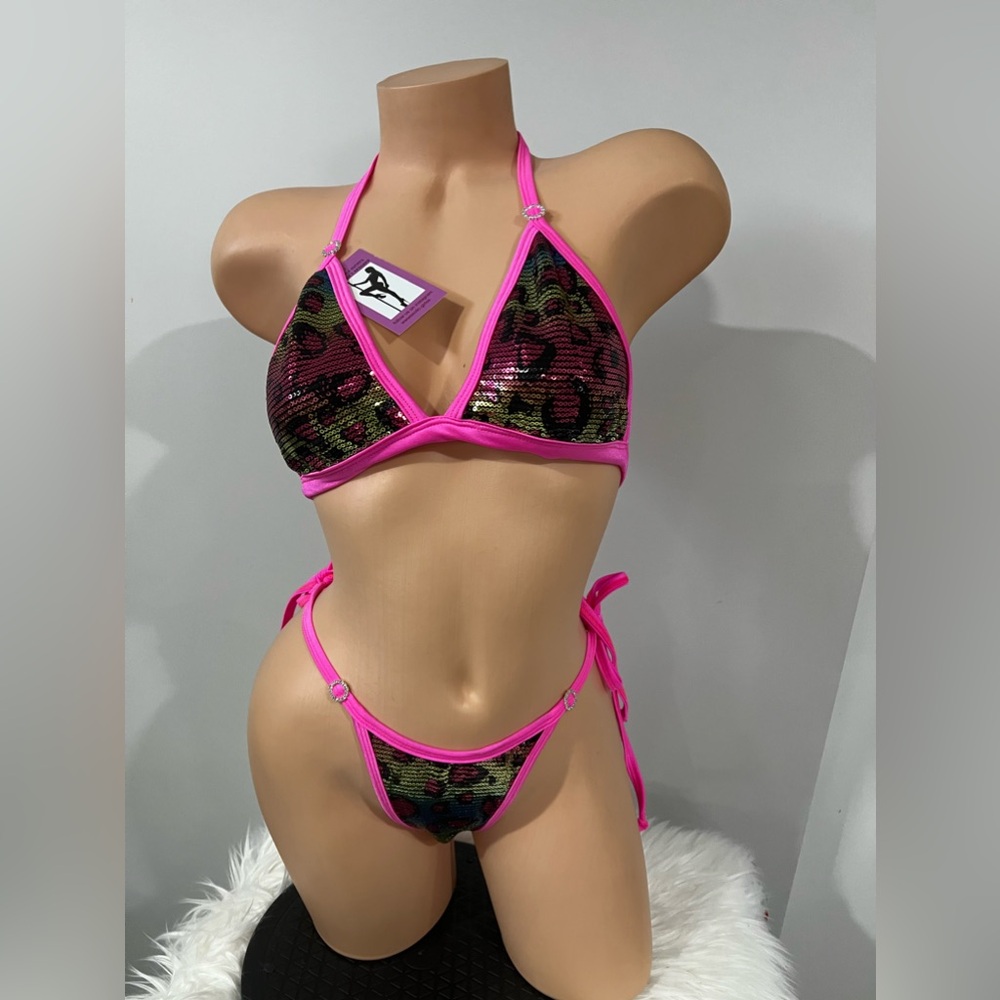 Exotic dancer wear hot pink sequins animal print